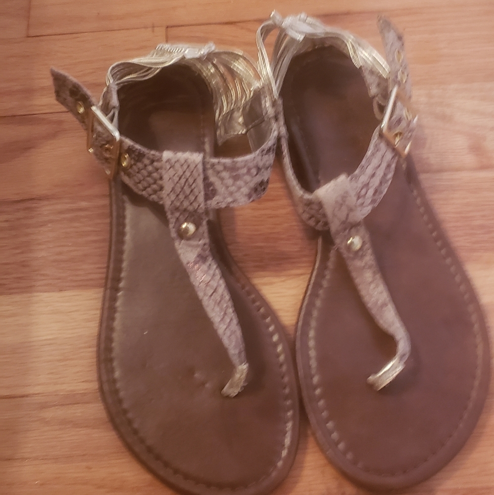 Flip flops used size 8 snake skin with gold ankle
